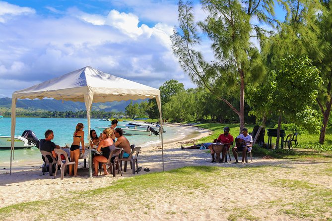 5 Islands Speedboat Cruise incl. Snorkeling in Blue Bay + Lunch at Ile aux Cerfs - Ile aux Cerfs, sand, refreshments, and first impressions