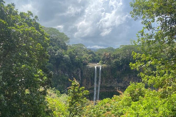 All Inclusive Full Day Tour: Chamarel Rhumrie,7-Coloured & Lunch - Grand Bassin and the religious heart of the island