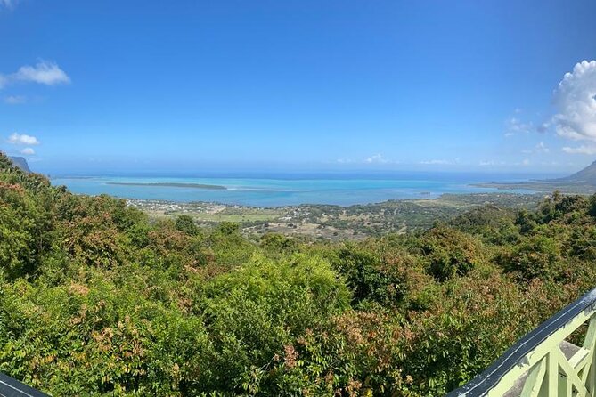 All Inclusive Full Day Tour: Chamarel Rhumrie,7-Coloured & Lunch - Rochester Falls, photographs, and a possible swim