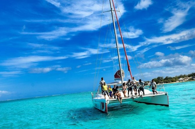 Catamaran Adventure Full Day: Ile aux cerfs,GRSE Waterfall,Snorkeling &BBQ Lunch - Grand River South East Waterfall by small boat