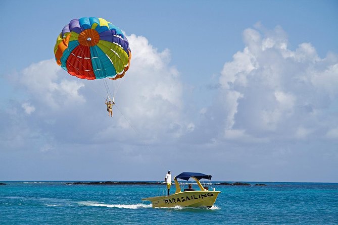 Catamaran to Ile aux Cerf with Parasailing, Tube Riding & Lunch - Snorkeling in the Trou d’Eau Douce lagoon