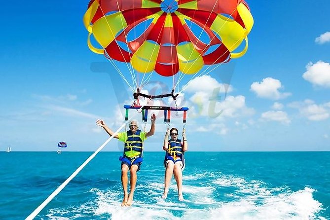 Catamaran to Ile aux Cerf with Parasailing, Tube Riding & Lunch - Ile aux Cerfs: beaches, water sports, and waiting time