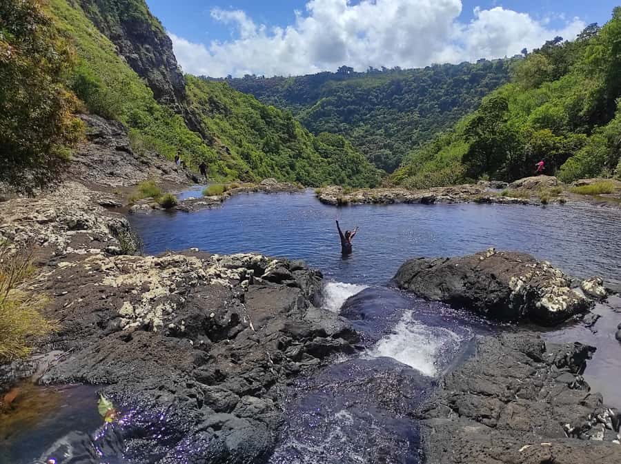 From Quatre Cocos: Tamarind Falls Hiking Day Trip - What to bring for a wet, steep trail