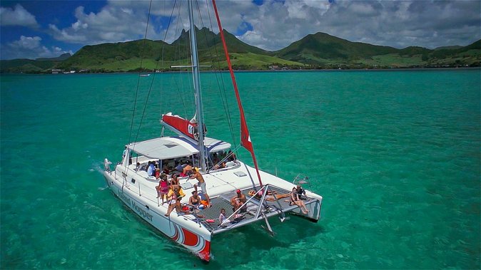 Full-Day Catamaran Cruise to Île aux Cerfs with BBQ Lunch - Lunch on board, with beer, wine, rum, and soft drinks