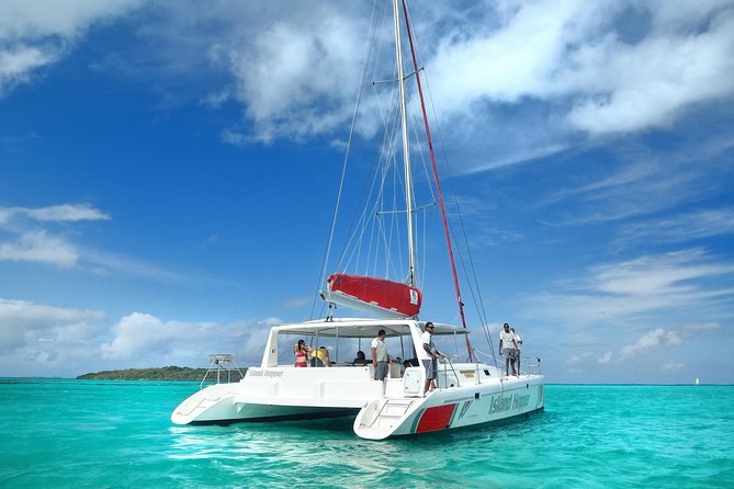 Full-Day Catamaran Cruise to Île aux Cerfs with BBQ Lunch - Arriving at Île aux Cerfs by the front ladder
