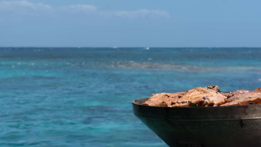 Full Day Catamaran Luxury Cruise to Northern Islands w Lunch - Sailing past Gunners Coin’s sheer cliffs