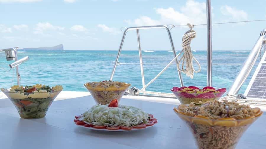Full Day Catamaran Luxury Cruise to Northern Islands w Lunch - Flat Island brings the first swim and snorkel