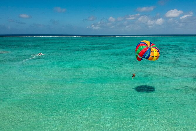 Full Day Shared Tour Catamaran to Ile Aux Cerfs - Lagoon views, coral reefs, and snorkeling