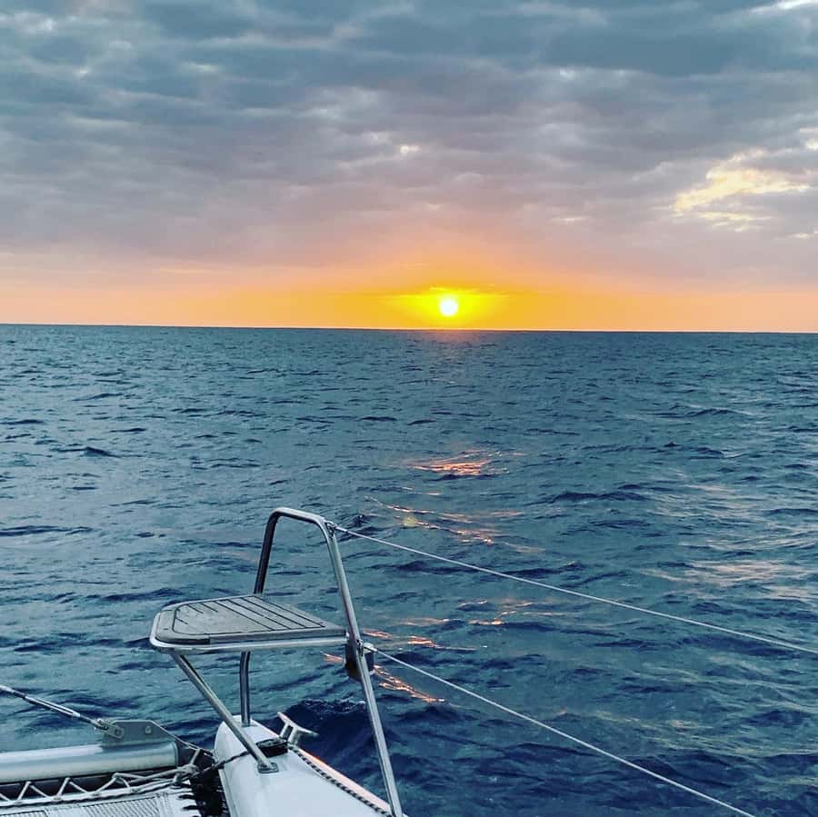 Grand Baie: Cocktail & Sunset Catamaran Cruise - Finding the orange-and-white Wind Dancer at 4:45 PM