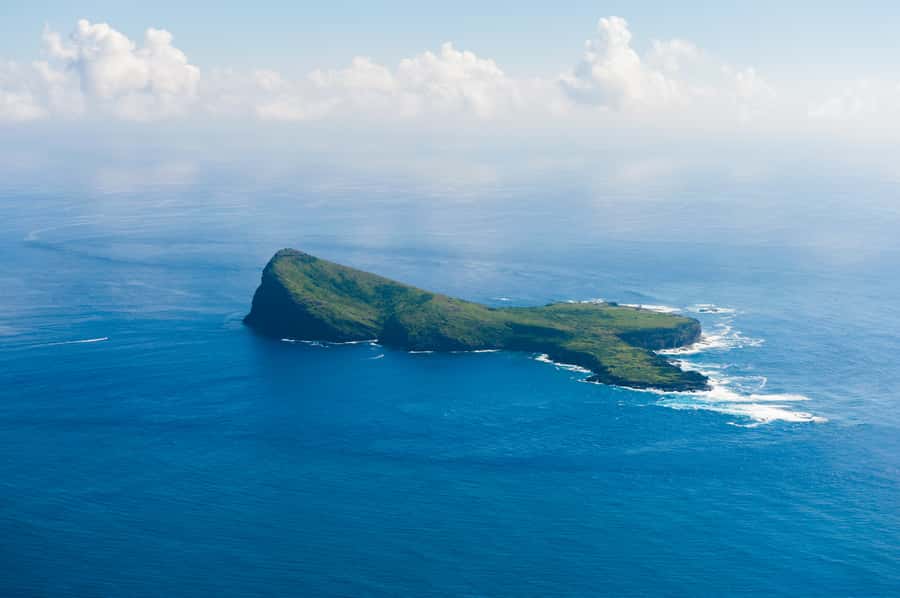 Grand Baie: Three Islands Private Boat Trip and Beach BBQ - Gabriel Island and the view toward Coin de Mire