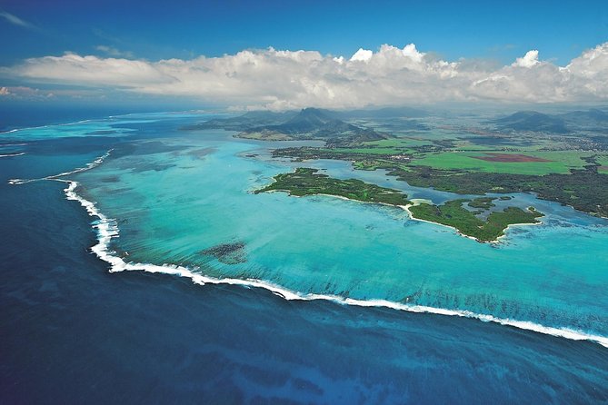 Marvelous Ile aux Cerf island: Speed Boat, Parasailing, Lunch & GRSE waterfall - The GRSE waterfall by boat