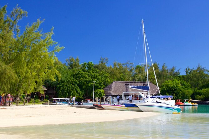 Mauritius: Catamaran Cruise to Ile Aux Cerfs with BBQ Lunch - Crew, music, and the feel on board