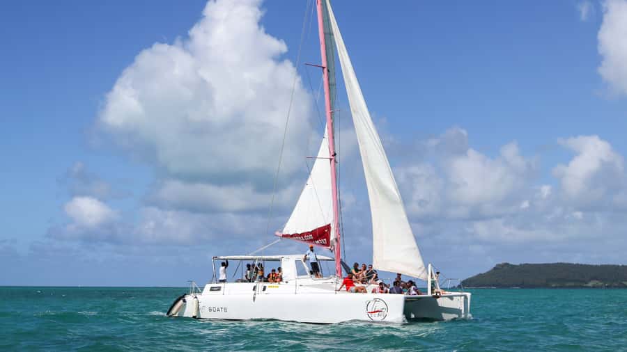 Mauritius: Catamaran Day Cruise to lle aux Cerfs with Lunch - Passing Ile aux Cerfs from the water