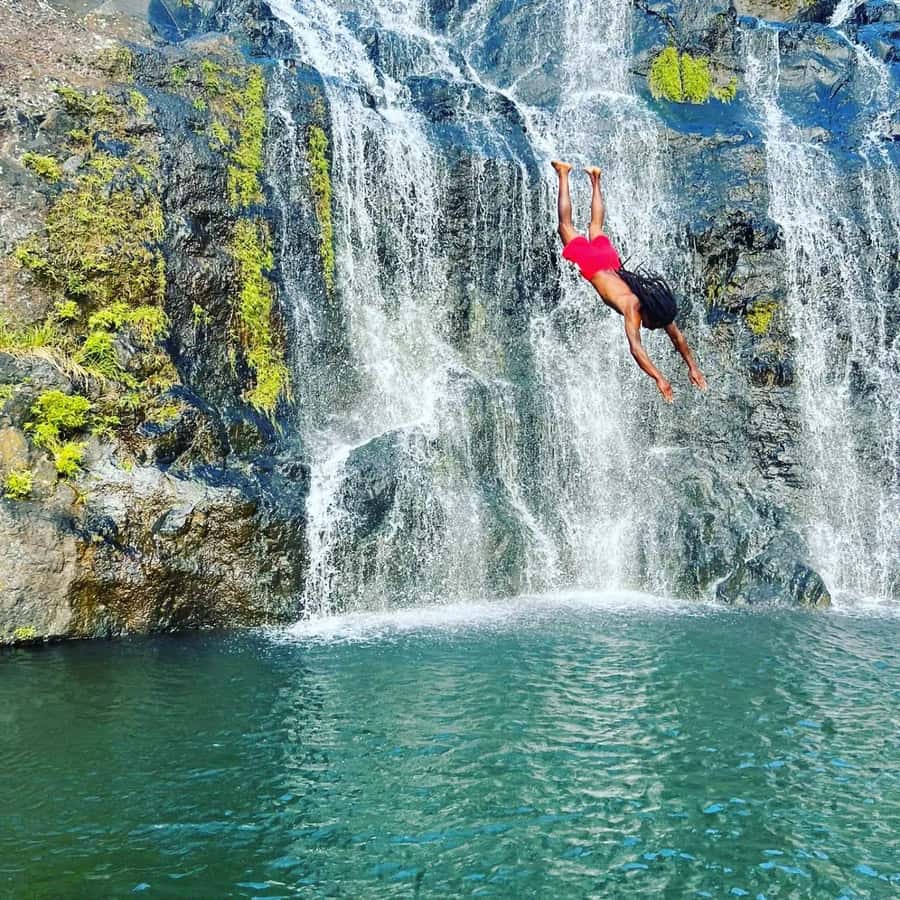 Mauritius Hiking 7 waterfalls Trip with Ganga Talao & Lunch - Colored Earth Park adds a visual finale