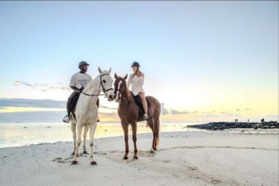 Horseback riding on the beach
