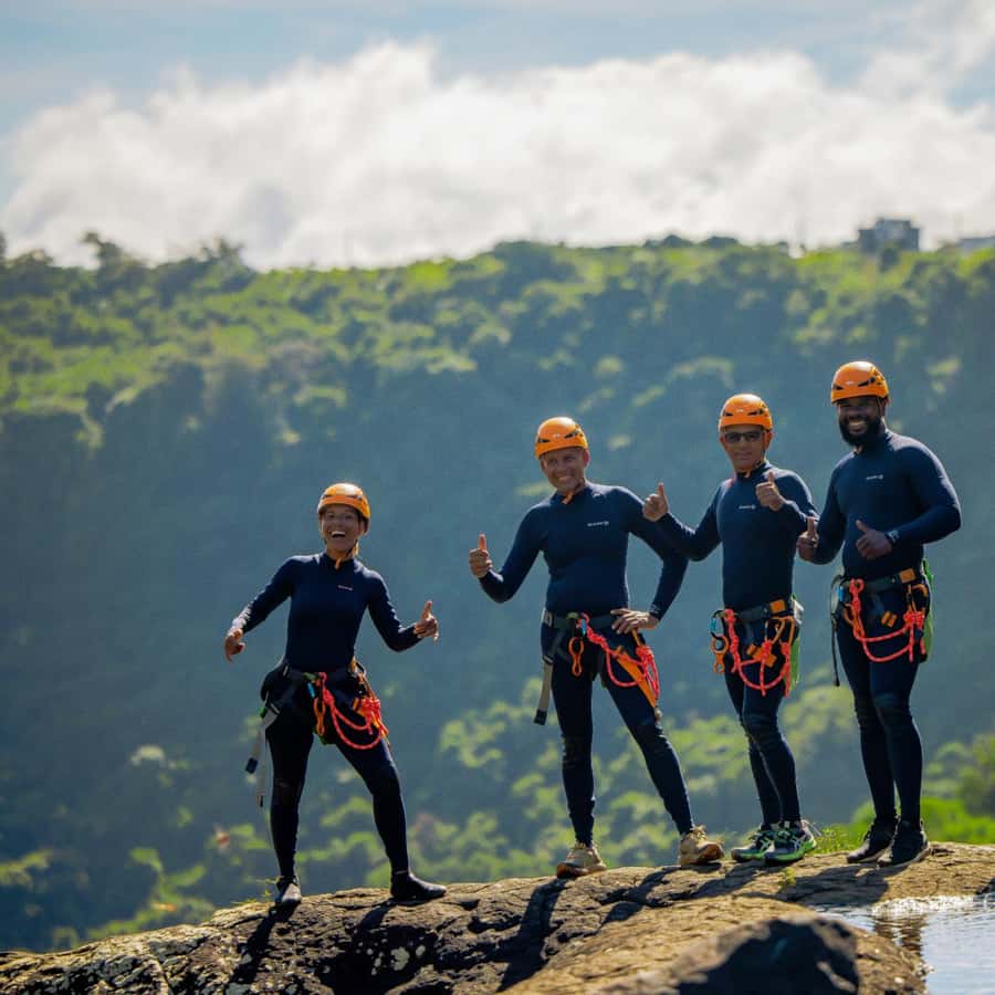 Mauritius: Tamarind Falls Canyoning Adventure - The first rappels: controlled excitement beside the water
