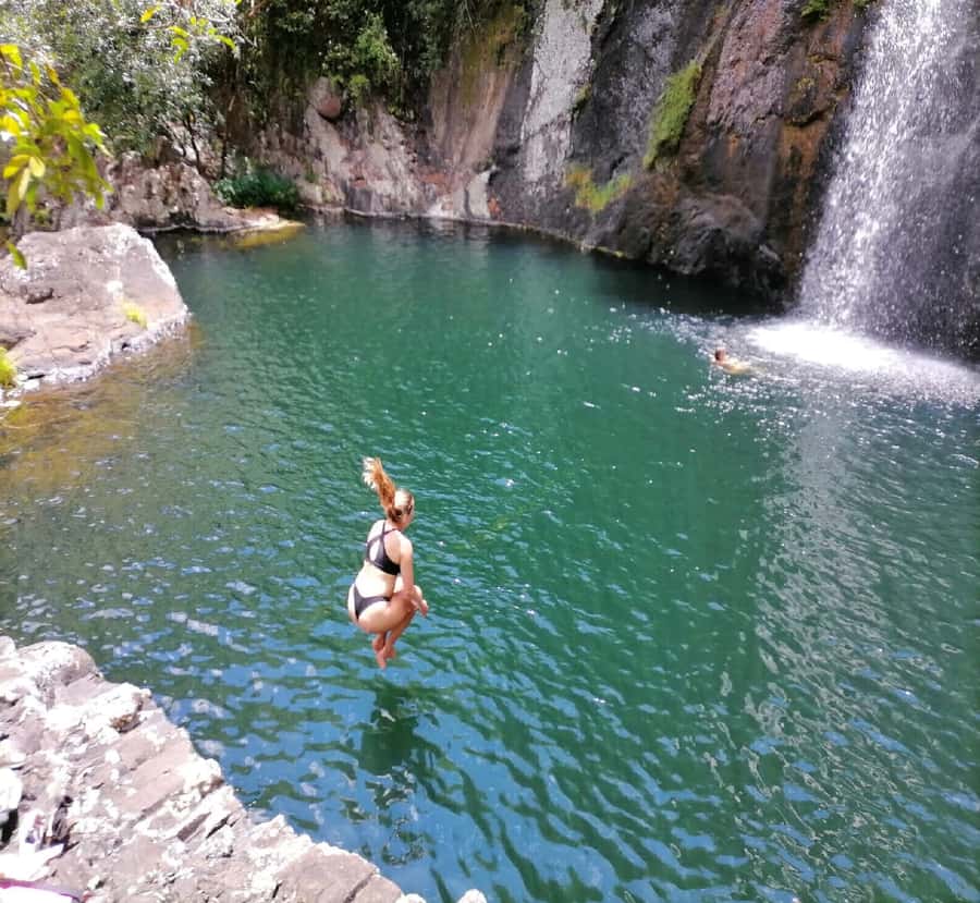 Mauritius: Tamarind Falls Guided Hike with Swim and Lunch - The first jump and the steep descent