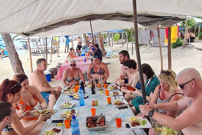Snorkel with Dolphins, Lunch on Benitiers island, Speedboat - Crystal Rock adds a short natural stop